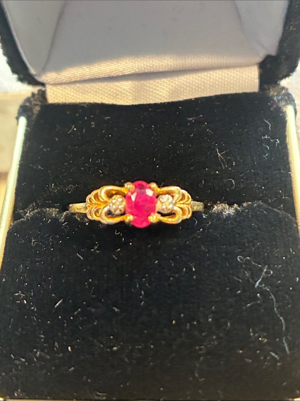 10K Gold Ring with Ruby Center Stone and Diamonds. 1.95 Grams Size 8